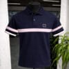 Polo Eden Park bleu marine à bande rose clair
