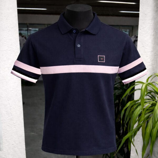Polo Eden Park bleu marine à bande rose clair